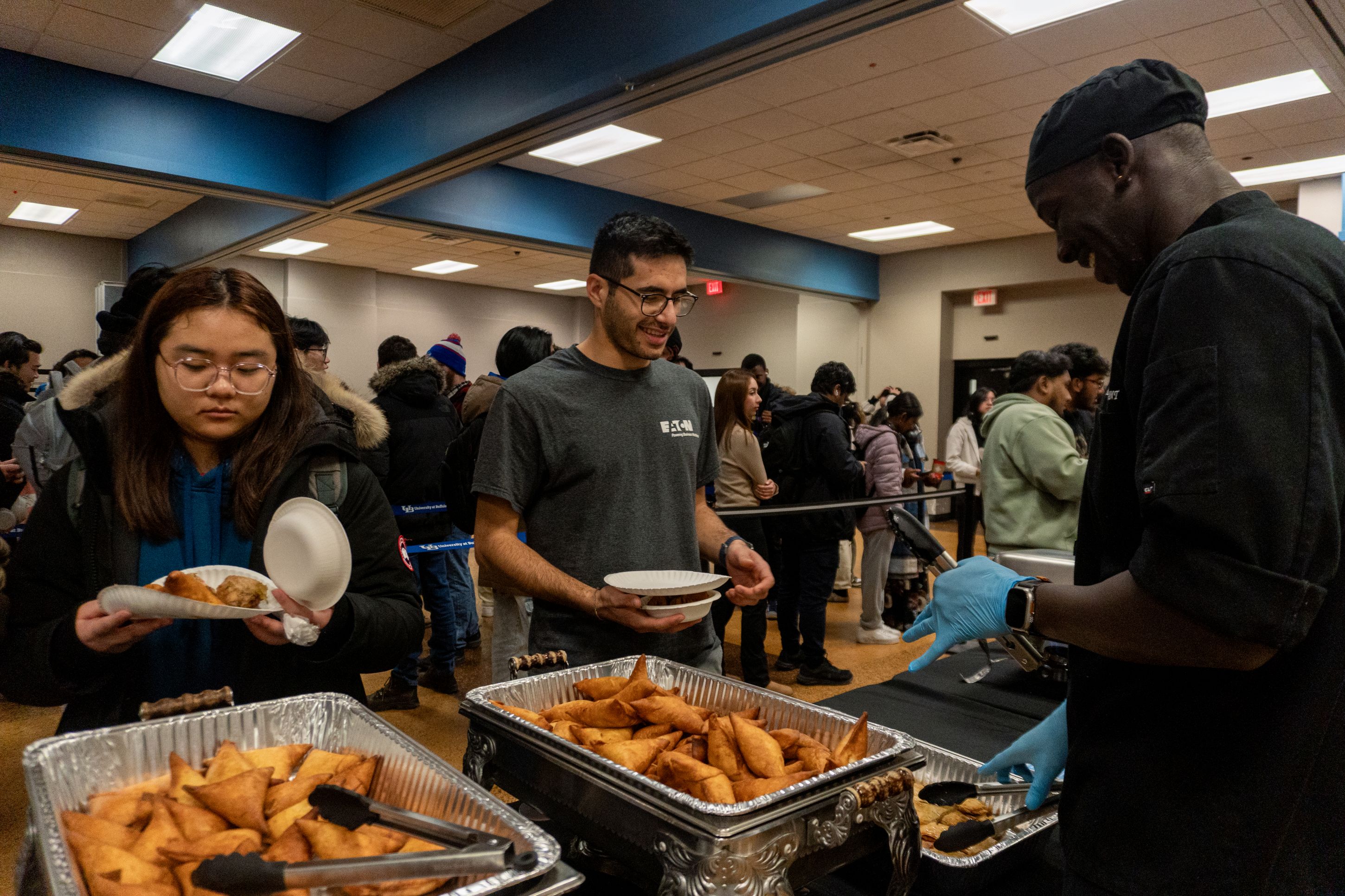 A person serving another person food